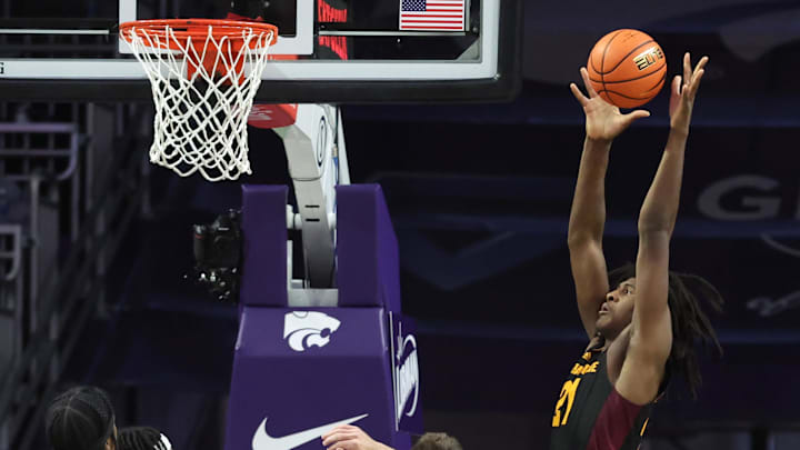 Feb 23, 2025; Manhattan, Kansas, USA; Arizona State Sun Devils forward Jayden Quaintance (21) grabs a rebound against Kansas State Wildcats guard Brendan Hausen (11 and guard Dug McDaniel (0) during the second half at Bramlage Coliseum. Mandatory Credit: Scott Sewell-Imagn Images Feb 23, 2025; Manhattan, Kansas, USA; Arizona State Sun Devils forward Jayden Quaintance (21) grabs a rebound against Kansas State Wildcats guard Brendan Hausen (11 and guard Dug McDaniel (0) during the second half at Bramlage Coliseum. Mandatory Credit: Scott Sewell-Imagn Images
