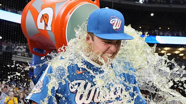 Jun 12, 2026; Milwaukee, Wisconsin, USA; Milwaukee Brewers pitcher Jacob Misiorowski (32) is doused with Gatorade  by outfielder Garrett Mitchell (5) after pitching all nine innings of a 6-0 win over the Philadelphia Phillies at American Family Field. Mandatory Credit: Michael McLoone-Imagn Images
