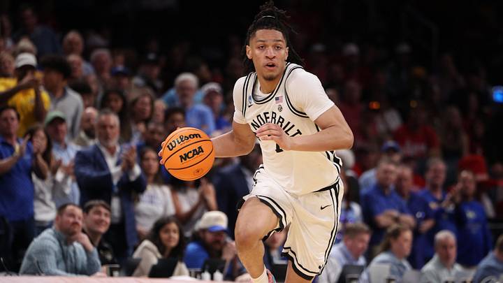 Mar 19, 2026; Oklahoma City, OK, USA; Vanderbilt Commodores guard Chandler Bing (7) dribbles downcourt during the second half against the McNeese Cowboys during a first round game of the men's 2026 NCAA Tournament at Paycom Center. Mandatory Credit: William Purnell-Imagn Images