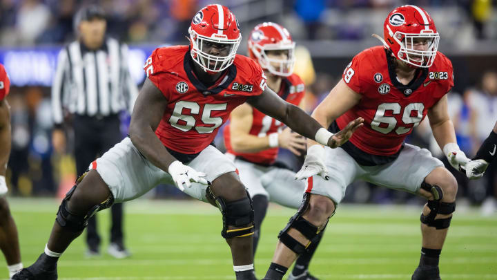 Jan 9, 2023; Inglewood, CA, USA; Georgia Bulldogs offensive lineman Amarius Mims (65) and offensive Jan 9, 2023; Inglewood, CA, USA; Georgia Bulldogs offensive lineman Amarius Mims (65) and offensive