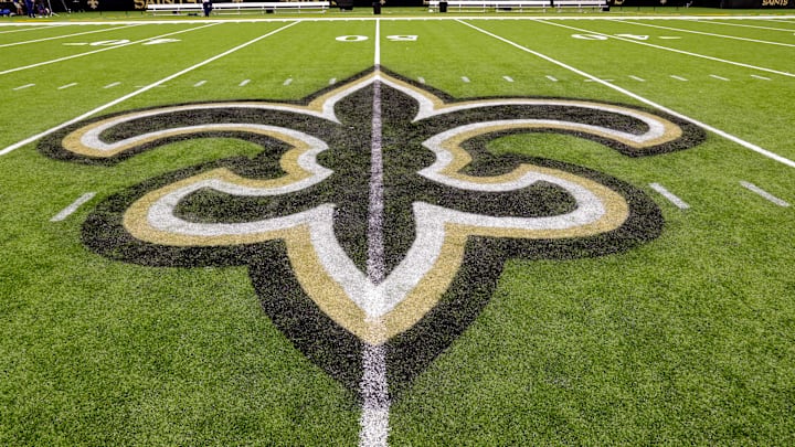 Oct 30, 2022; New Orleans, Louisiana, USA; General view of the New Orleans Saints logo as the midfield logo fleur-de-lis after the game between the New Orleans Saints and the Las Vegas Raiders at Caesars Superdome. Mandatory Credit: Stephen Lew-Imagn Images Oct 30, 2022; New Orleans, Louisiana, USA; General view of the New Orleans Saints logo as the midfield logo fleur-de-lis after the game between the New Orleans Saints and the Las Vegas Raiders at Caesars Superdome. Mandatory Credit: Stephen Lew-Imagn Images