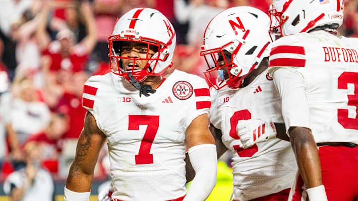 Nebraska defensive back Malcolm Hartzog Jr. (7) celebrates with Vincent Shavers Jr. (9) and Marques Buford Jr. (3) after his interception in the final minute against Cincinnati.