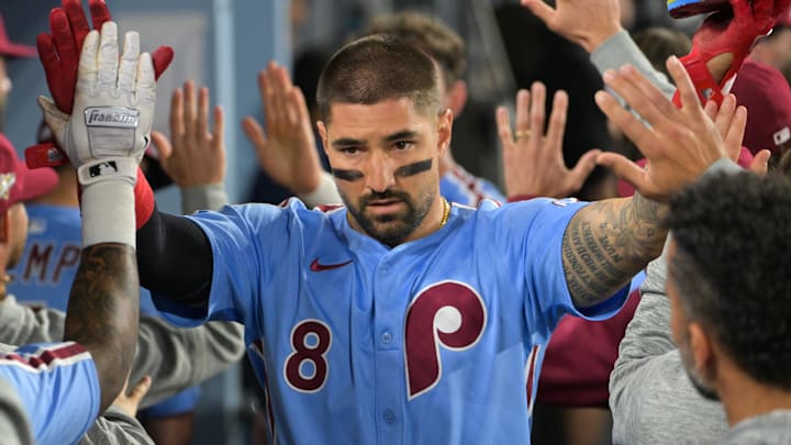 Oct 8, 2025; Los Angeles, California, USA; Philadelphia Phillies right fielder Nick Castellanos (8) celebrates after scoring a run during the eighth inning against the Los Angeles Dodgers during game three of the NLDS round for the 2025 MLB playoffs at Dodger Stadium. Oct 8, 2025; Los Angeles, California, USA; Philadelphia Phillies right fielder Nick Castellanos (8) celebrates after scoring a run during the eighth inning against the Los Angeles Dodgers during game three of the NLDS round for the 2025 MLB playoffs at Dodger Stadium.