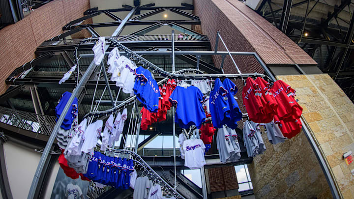Apr 5, 2021; Arlington, Texas, USA; A view of Texas Rangers jerseys for sale during the game between the Texas Rangers and the Toronto Blue Jays at Globe Life Field. Mandatory Credit: Jerome Miron-Imagn Images