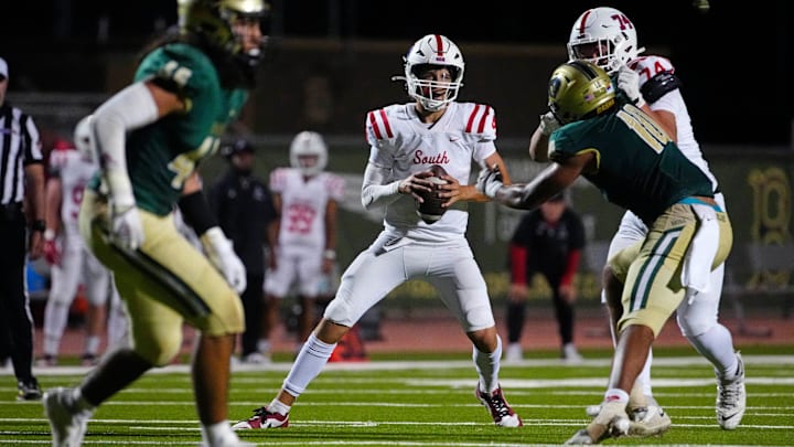 Millard South Jett Thomalla (4) looks for receivers against Basha during a game at Basha High School in Chandler, Arizona, on Friday, Aug. 30, 2024. Millard South Jett Thomalla (4) looks for receivers against Basha during a game at Basha High School in Chandler, Arizona, on Friday, Aug. 30, 2024.