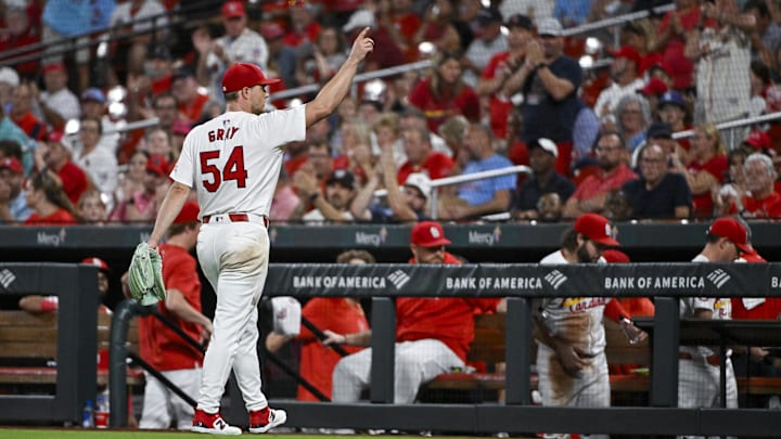 Sep 18, 2024; St. Louis, Missouri, USA;  St. Louis Cardinals starting pitcher Sonny Gray (54) points to the crowd as he walks to the dugout after he was removed from the game against the Pittsburgh Pirates during the sixth inning at Busch Stadium. 