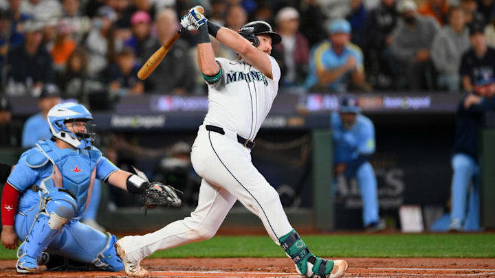 Oct 17, 2025; Seattle, Washington, USA; Seattle Mariners catcher Cal Raleigh (29) hits a double against the Toronto Blue Jays during the first inning during game five of the ALCS round for the 2025 MLB playoffs at T-Mobile Park. Mandatory Credit: Steven Bisig-Imagn Images Oct 17, 2025; Seattle, Washington, USA; Seattle Mariners catcher Cal Raleigh (29) hits a double against the Toronto Blue Jays during the first inning during game five of the ALCS round for the 2025 MLB playoffs at T-Mobile Park. Mandatory Credit: Steven Bisig-Imagn Images