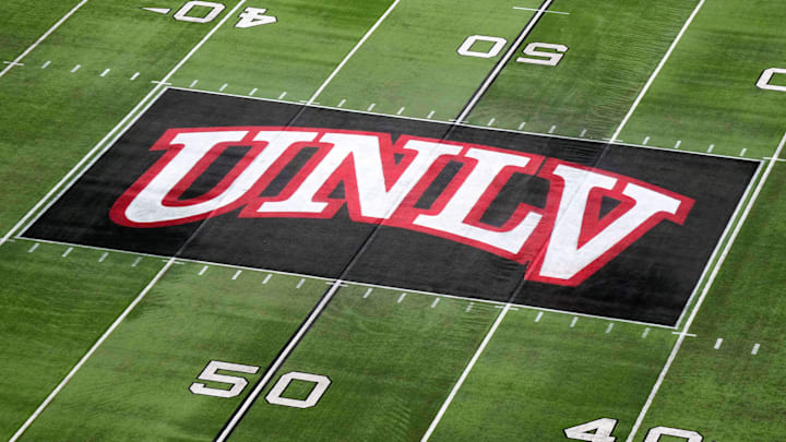 The UNLV Rebels logo at midfield during the Mountain West Championship at Allegiant Stadium. Mandatory Credit: Kirby Lee-Imagn Images