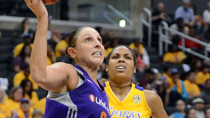 Sep 19, 2013; Los Angeles, CA, USA;  Los Angeles Sparks guard Lindsey Harding (10) guards Phoenix Mercury guard Diana Taurasi (3) in the second half of game 1 of the Western Conference semi-finals at Staples Center. Phoenix won 86-75. Mandatory Credit: Jayne Kamin-Oncea-Imagn Images