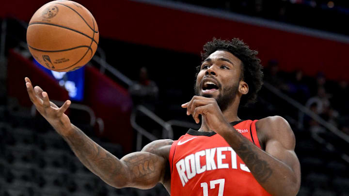 Nov 10, 2024; Detroit, Michigan, USA;  Houston Rockets forward Tari Eason (17) loses control of the ball while driving to the basket against the Detroit Pistons in the first quarter at Little Caesars Arena. Mandatory Credit: Lon Horwedel-Imagn Images