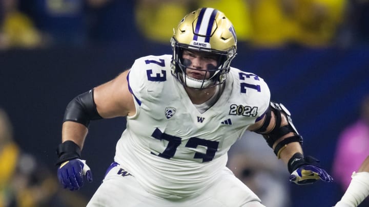 Jan 8, 2024; Houston, TX, USA; Washington Huskies offensive lineman Roger Rosengarten (73) against