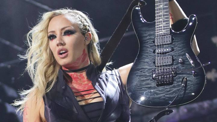 Nita Strauss, guitarist, performing with Alice Cooper. Nita Strauss, guitarist, performing with Alice Cooper.