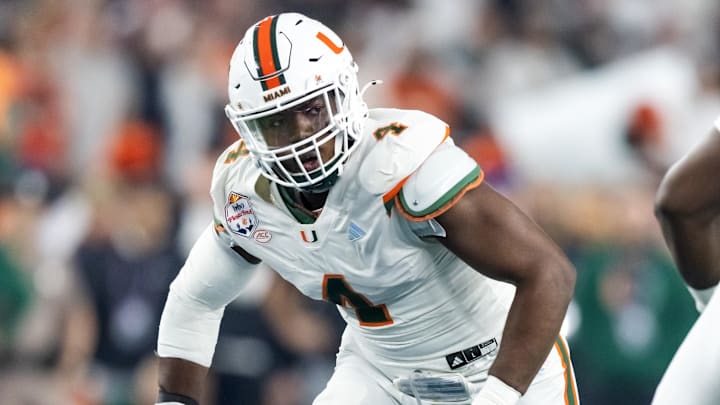 Jan 8, 2026; Glendale, AZ, USA; Miami Hurricanes defensive lineman Rueben Bain Jr. (4) against the Mississippi Rebels during the 2026 Fiesta Bowl and semifinal game of the College Football Playoff at State Farm Stadium. Mandatory Credit: Mark J. Rebilas-Imagn Images