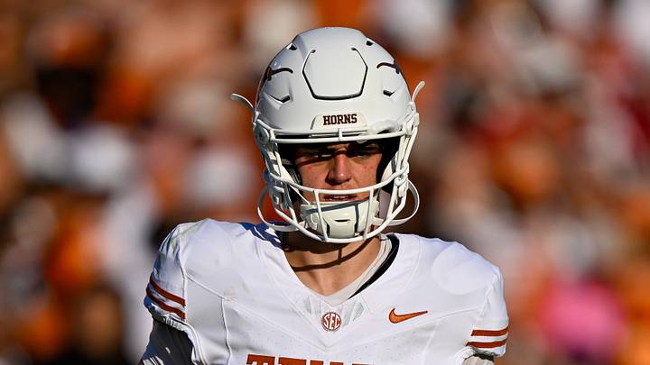 Oct 10, 2026; Dallas, Texas, USA; Texas Longhorns quarterback Arch Manning (16) runs back on the field during the game between the Sooners and the Longhorns at Cotton Bowl. Mandatory Credit: Jerome Miron-Imagn Images