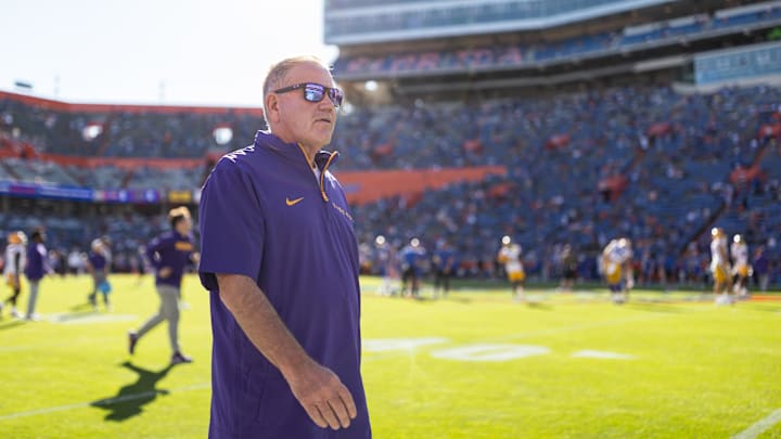Nov 16, 2024; Gainesville, Florida, USA; LSU Tigers head coach Brian Kelly walks onto the field before a game against the Florida Gators at Ben Hill Griffin Stadium. Mandatory Credit: Matt Pendleton-Imagn Images