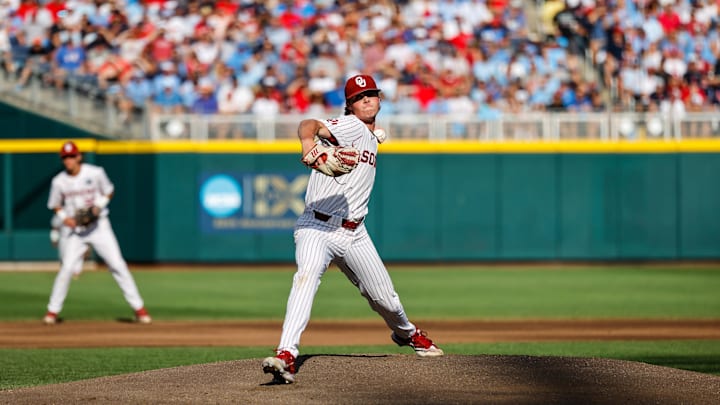 Jun 25, 2022; Omaha, NE, USA; Oklahoma Sooners starting pitcher Jake Bennett (54) throws agains the Ole Miss Rebels at Charles Schwab Field. 