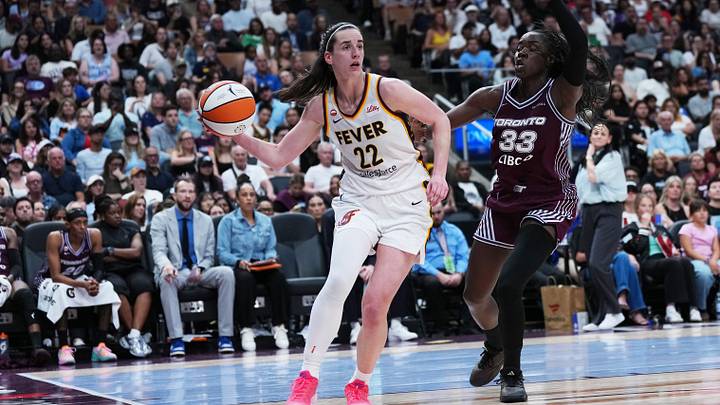 Aug 18, 2026; Toronto, Ontario, CAN; Indiana Fever guard Caitlin Clark (22) controls the ball as Toronto Tempo forward Ornella Bankole (33) tries to defend during the fourth quarter at Scotiabank Arena. Mandatory Credit: Nick Turchiaro-Imagn Images Aug 18, 2026; Toronto, Ontario, CAN; Indiana Fever guard Caitlin Clark (22) controls the ball as Toronto Tempo forward Ornella Bankole (33) tries to defend during the fourth quarter at Scotiabank Arena. Mandatory Credit: Nick Turchiaro-Imagn Images