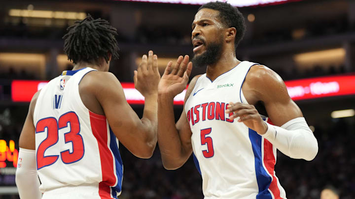 Dec 26, 2024; Sacramento, California, USA; Detroit Pistons guard Malik Beasley (5) high fives guard Jaden Ivey (23) after a play against the Sacramento Kings during the third quarter at Golden 1 Center. Mandatory Credit: Kelley L Cox-Imagn Images