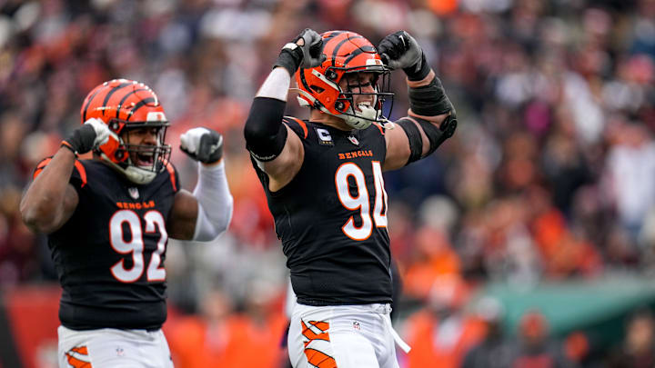 Cincinnati Bengals defensive end Sam Hubbard (94) and defensive tackle BJ Hill (92) celebrate Hubbard’s sack in the first quarter of the NFL Week 18 game between the Cincinnati Bengals and the Cleveland Browns at Paycor Stadium in downtown Cincinnati on Sunday, Jan. 7, 2024.