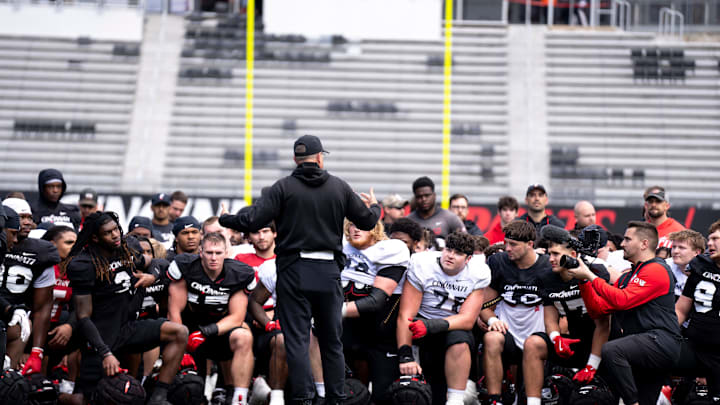 Cincinnati Bearcats head coach Scott Satterfield speaks to the team during the Cincinnati Bearcats football spring practice at Nippert Stadium on Saturday, April 12, 2025. Cincinnati Bearcats head coach Scott Satterfield speaks to the team during the Cincinnati Bearcats football spring practice at Nippert Stadium on Saturday, April 12, 2025.