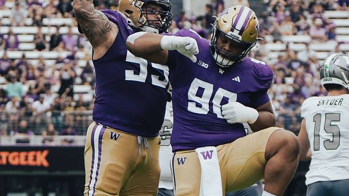 Elinneus Davis (90) celebrates his first career sack. Elinneus Davis (90) celebrates his first career sack.