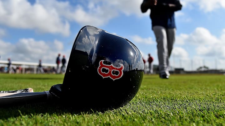 Feb 18, 2019; Lee County, FL, USA; A general view of a Boston Red Sox helmet as Boston Red Sox center fielder Jackie Bradley Jr. (19) walks on the field during a spring training workout at Jet Blue Park at Fenway South. Mandatory Credit: Jasen Vinlove-Imagn Images