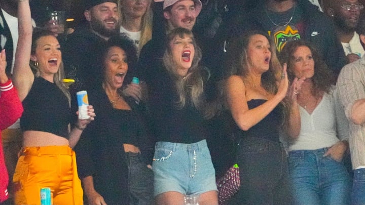 Taylor Swift, a guest of Kansas City Chiefs tight end Travis Kelce, cheers during the \"Sunday Night Football\" game at MetLife Stadium.