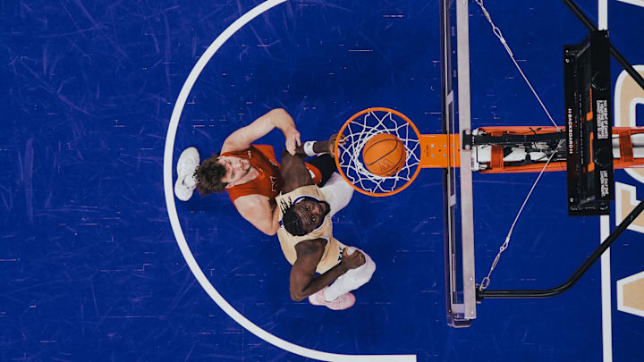 Franck Kepnang watches a shot go in against Nebraska. 