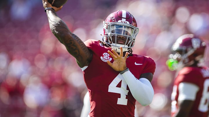 Oct 26, 2024; Tuscaloosa, Alabama, USA; Alabama Crimson Tide quarterback Jalen Milroe (4) makes a throw during warmups before a game against the Missouri Tigers at Bryant-Denny Stadium. Mandatory Credit: Will McLelland-Imagn Images