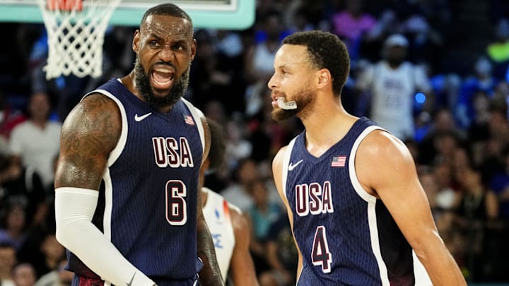 Aug 10, 2024; Paris, France; United States guard Lebron James (6) and United States shooting guard Stephen Curry (4) in the men's basketball gold medal game during the Paris 2024 Olympic Summer Games at Accor Arena. Mandatory Credit: Rob Schumacher-Imagn Images Aug 10, 2024; Paris, France; United States guard Lebron James (6) and United States shooting guard Stephen Curry (4) in the men's basketball gold medal game during the Paris 2024 Olympic Summer Games at Accor Arena. Mandatory Credit: Rob Schumacher-Imagn Images
