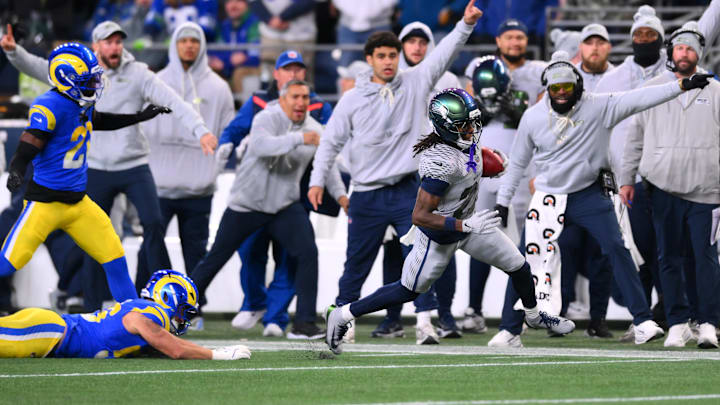 Dec 18, 2025; Seattle, Washington, USA; Seattle Seahawks wide receiver Rashid Shaheed (22) returns a punt for a touchdown against the Los Angeles Rams in the second half at Lumen Field. Mandatory Credit: Steven Bisig-Imagn Images