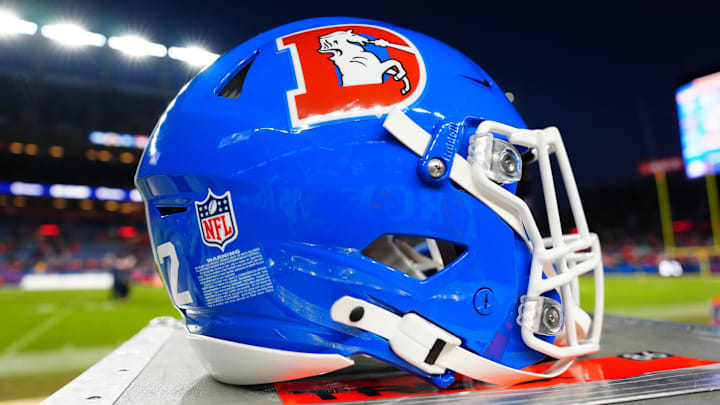 Jan 5, 2025; Denver, Colorado, USA; Detailed view of a Denver Broncos throwback helmet following the win against the Kansas City Chiefs at Empower Field at Mile High. Mandatory Credit: Ron Chenoy-Imagn Images