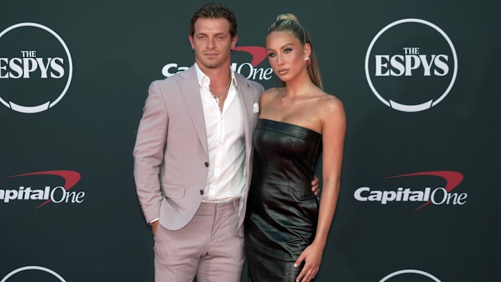 Alix Earle arrives with Braxton Berrios on the red carpet before the 2023 ESPYS at the Dolby Theatre.