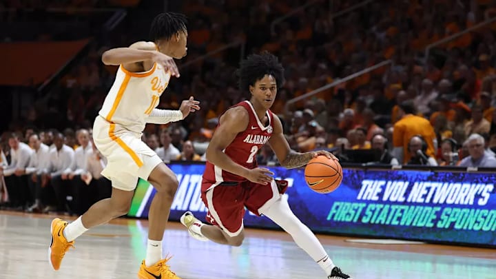 Alabama guard Aden Holloway (2) dribbles the ball against Tennessee at Thompson-Boling Arena at Food City Center in Knoxville, TN on Saturday, Mar 1, 2025.