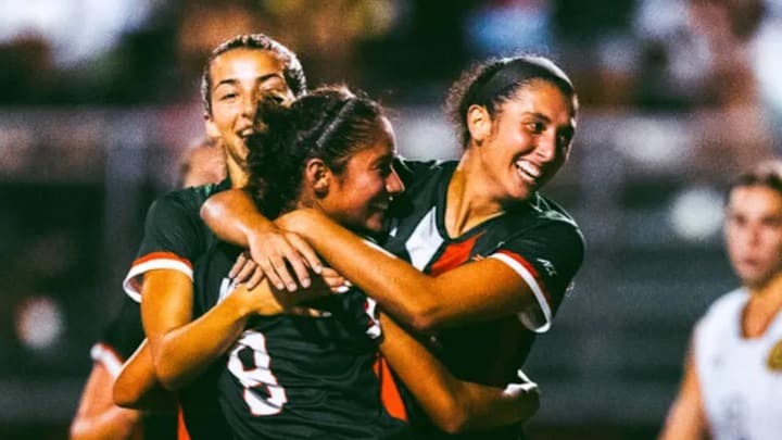 Miami Hurricanes Soccer Team Celebrating A Goal Miami Hurricanes Soccer Team Celebrating A Goal