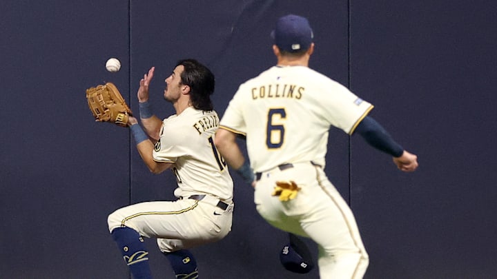 Sal Frelick plays a ball off the wall to start a double play against the Dodgers.