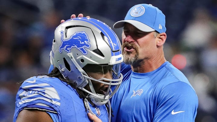 Detroit Lions head coach Dan Campbell hugs defensive tackle Alim McNeill during warmups before the game vs. the Carolina Panthers at Ford Field in Detroit on Sunday, Oct. 8, 2023.
