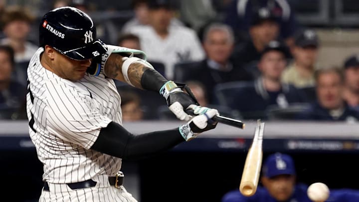Oct 30, 2024; New York, New York, USA; New York Yankees second baseman Gleyber Torres (25) breaks his bat on a ground out during the seventh inning against the Los Angeles Dodgers in game five of the 2024 MLB World Series at Yankee Stadium. Mandatory Credit: Vincent Carchietta-Imagn Images
