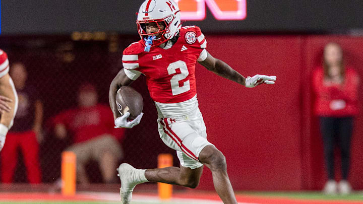 Nebraska punt returner Jacory Barney Jr. races 39 yards on a punt return against Akron.