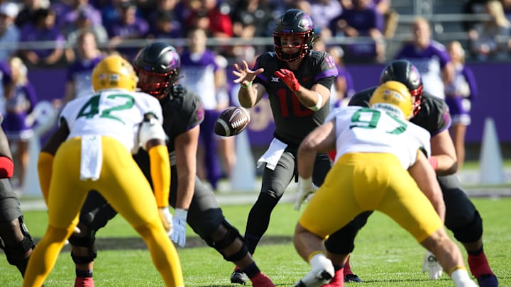 TCU Quarterback Josh Hoover takes the snap against the Baylor Bears in 2023. 