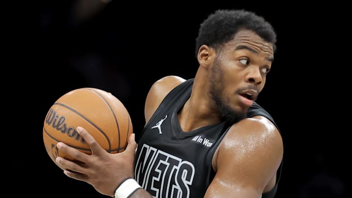 Feb 7, 2026; Brooklyn, New York, USA; Brooklyn Nets center Day'ron Sharpe (20) controls the ball against the Washington Wizards during the fourth quarter at Barclays Center. Mandatory Credit: Brad Penner-Imagn Images