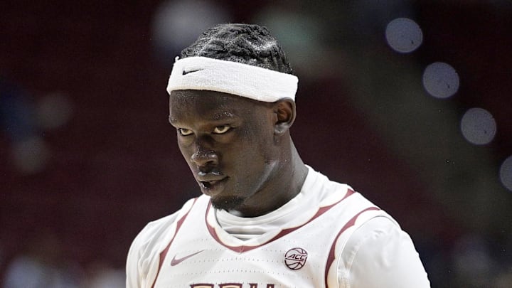 Feb 24, 2025; Tallahassee, Florida, USA; Florida State Seminoles forward Jerry Deng (7) reacts after shooting a three point shot during the first half against the North Carolina Tarheels at Donald L. Tucker Center. Mandatory Credit: Melina Myers-Imagn Images Feb 24, 2025; Tallahassee, Florida, USA; Florida State Seminoles forward Jerry Deng (7) reacts after shooting a three point shot during the first half against the North Carolina Tarheels at Donald L. Tucker Center. Mandatory Credit: Melina Myers-Imagn Images