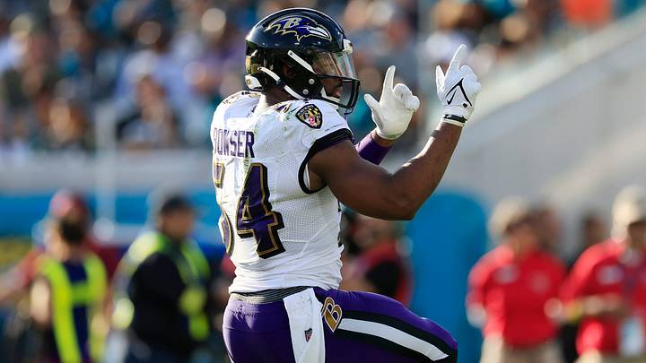 Baltimore Ravens linebacker Tyus Bowser (54) signals a first down pick up during the third quarter of a regular season NFL football matchup Sunday, Nov. 27, 2022, at TIAA Bank Field in Jacksonville. The Jaguars edged the Ravens 28-27. [Corey Perrine/Florida Times-Union]