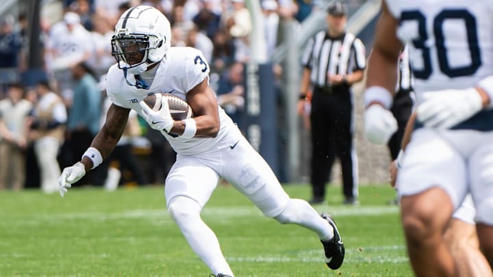 Penn State wide receiver Koby Howard runs with the ball during the 2025 Blue-White Game at Beaver Stadium.