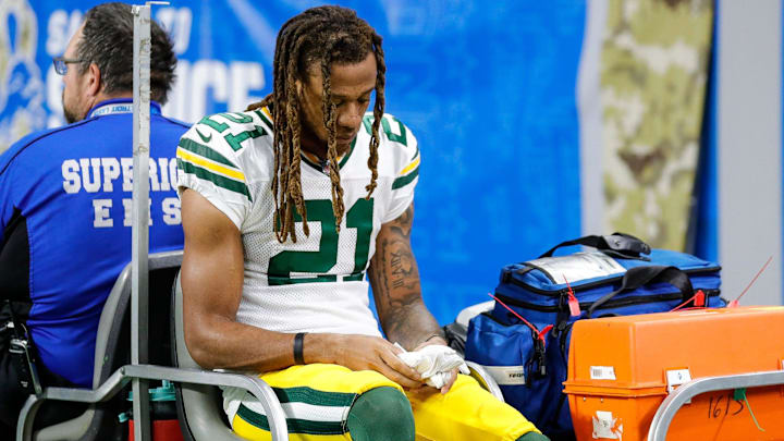 Green Bay Packers cornerback Eric Stokes (21) is carted off the field during the first half against Detroit Lions at Ford Field, Nov. 6, 2022.
