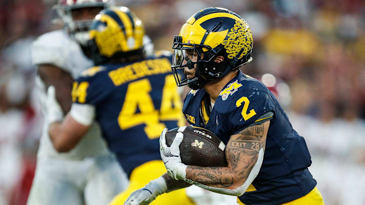 Michigan running back Blake Corum (2) runs against Alabama during the second half of the Rose Bowl