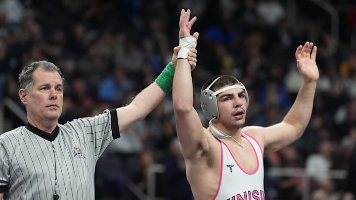 PJ Duke from Minisink Valley has has hand raised after winning a bout at the 2025 NYSPHSAA Wrestling Championships.  