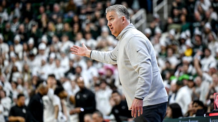 Purdue's head coach Matt Painter reacts to a no call 