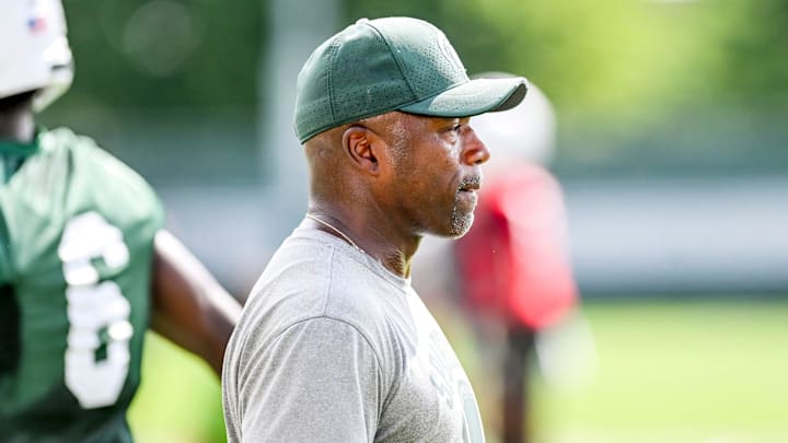 Michigan State's wide receivers coach Courtney Hawkins looks on during the first day of football camp on Tuesday, July 30, 2024, in East Lansing. Michigan State's wide receivers coach Courtney Hawkins looks on during the first day of football camp on Tuesday, July 30, 2024, in East Lansing.