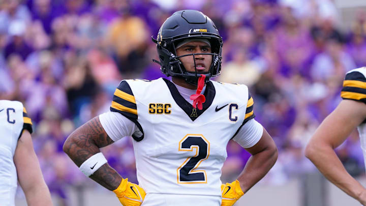 Sep 14, 2024; Greenville, North Carolina, USA; Appalachian State Mountaineers wide receiver Kaedin Robinson (2) looks on against the East Carolina Pirates during the first half at Dowdy-Ficklen Stadium. Mandatory Credit: James Guillory-Imagn Images Sep 14, 2024; Greenville, North Carolina, USA; Appalachian State Mountaineers wide receiver Kaedin Robinson (2) looks on against the East Carolina Pirates during the first half at Dowdy-Ficklen Stadium. Mandatory Credit: James Guillory-Imagn Images